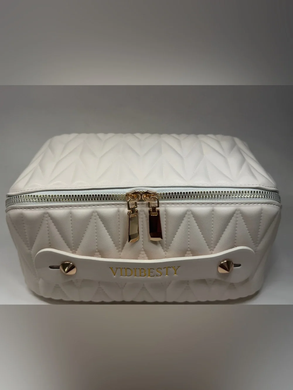 White Quilted Cosmetic Case with Gold Accents